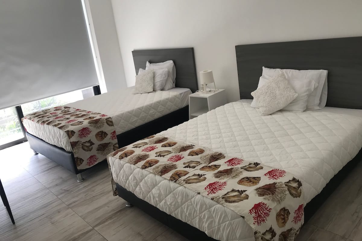 Standard Quadruple Room, 2 Double Beds | Bed sheets