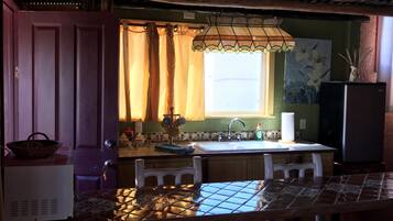 Room, Multiple Beds, Courtyard View | Private kitchenette | Fridge, microwave, coffee/tea maker