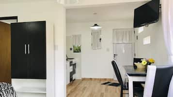 Design Loft, 1 Queen Bed, Mountain View | Living area | Flat-screen TV