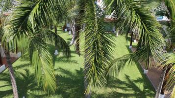 Villa exclusiva, 3 habitaciones, vista a la alberca | Vista al jardín