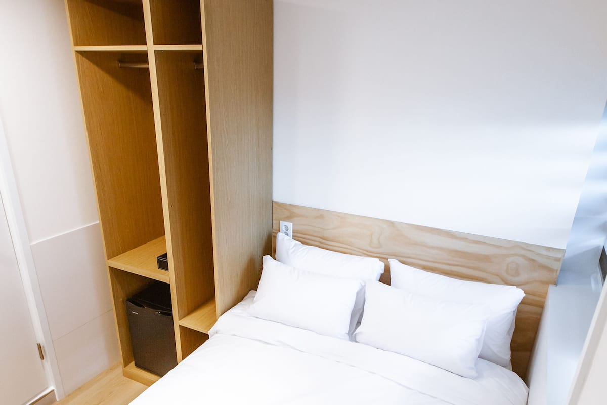 Double Room, City View | Iron/ironing board, free WiFi, bed sheets