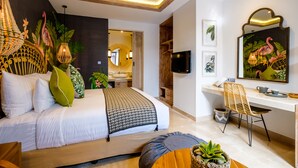 A modern bedroom with a bed, bedside table, desk, chair, and a large mirror. - The Akasha Seminyak Bali Boutique Hotel (Keroboken Kelod)