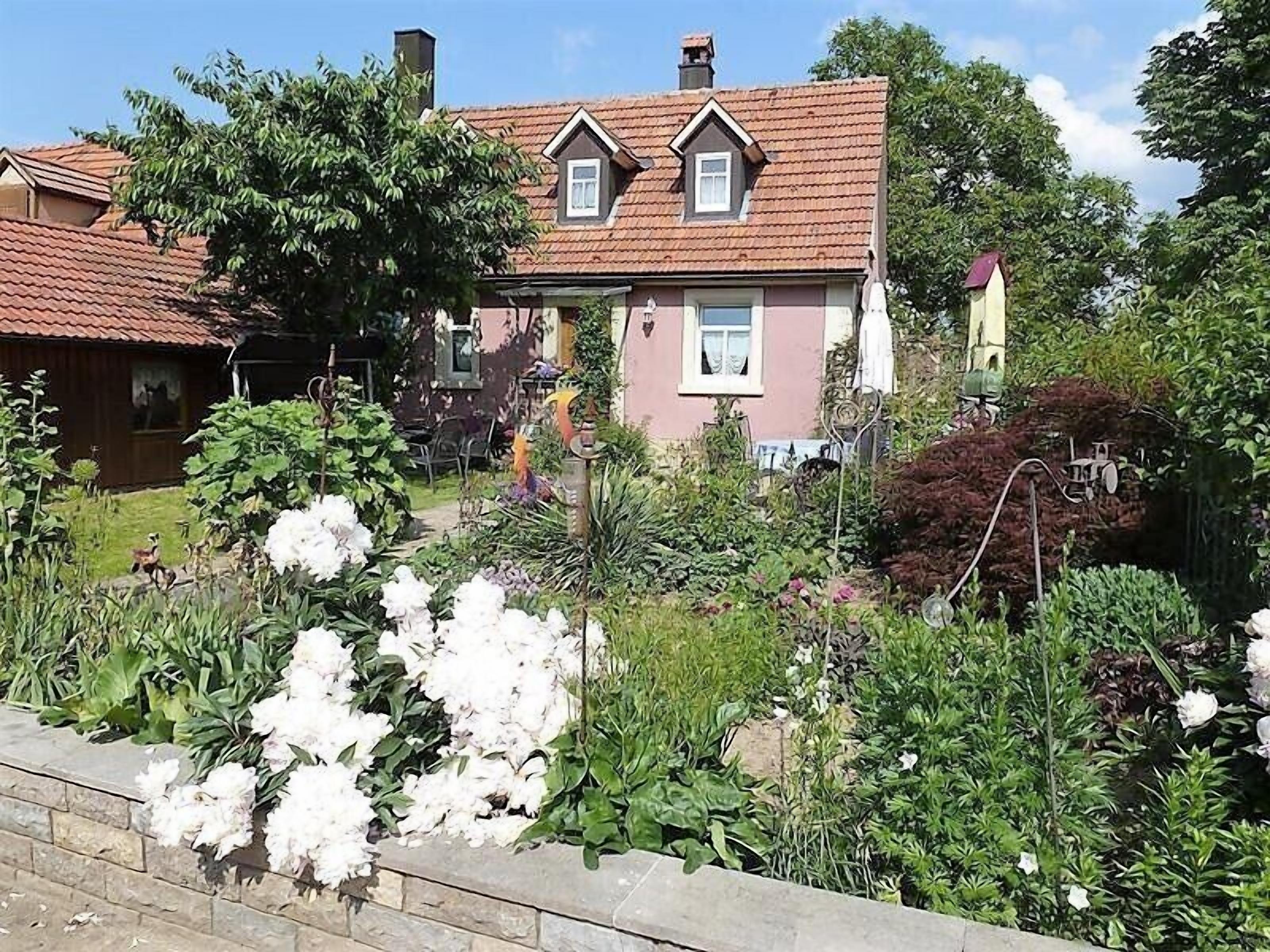 Ferienbauernhof Storchenhäusle (Simmershofen)-Haus mit Garten