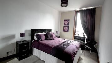 Apartment, 1 Bedroom | Desk, iron/ironing board, free WiFi, bed sheets