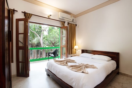 Apartamento família, 2 quartos, vista para o jardim | Wi-Fi de cortesia, roupa de cama. Casa Margarida