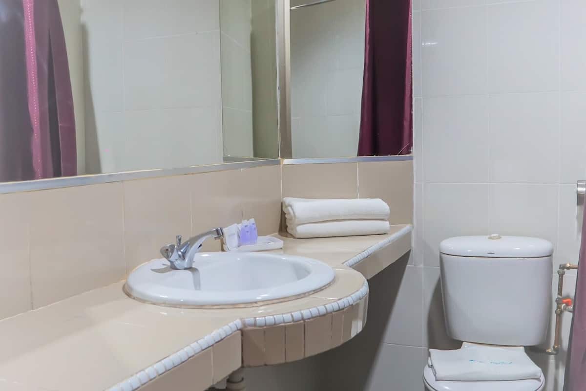 family suite | bathroom | shower, slippers, bidet, towels