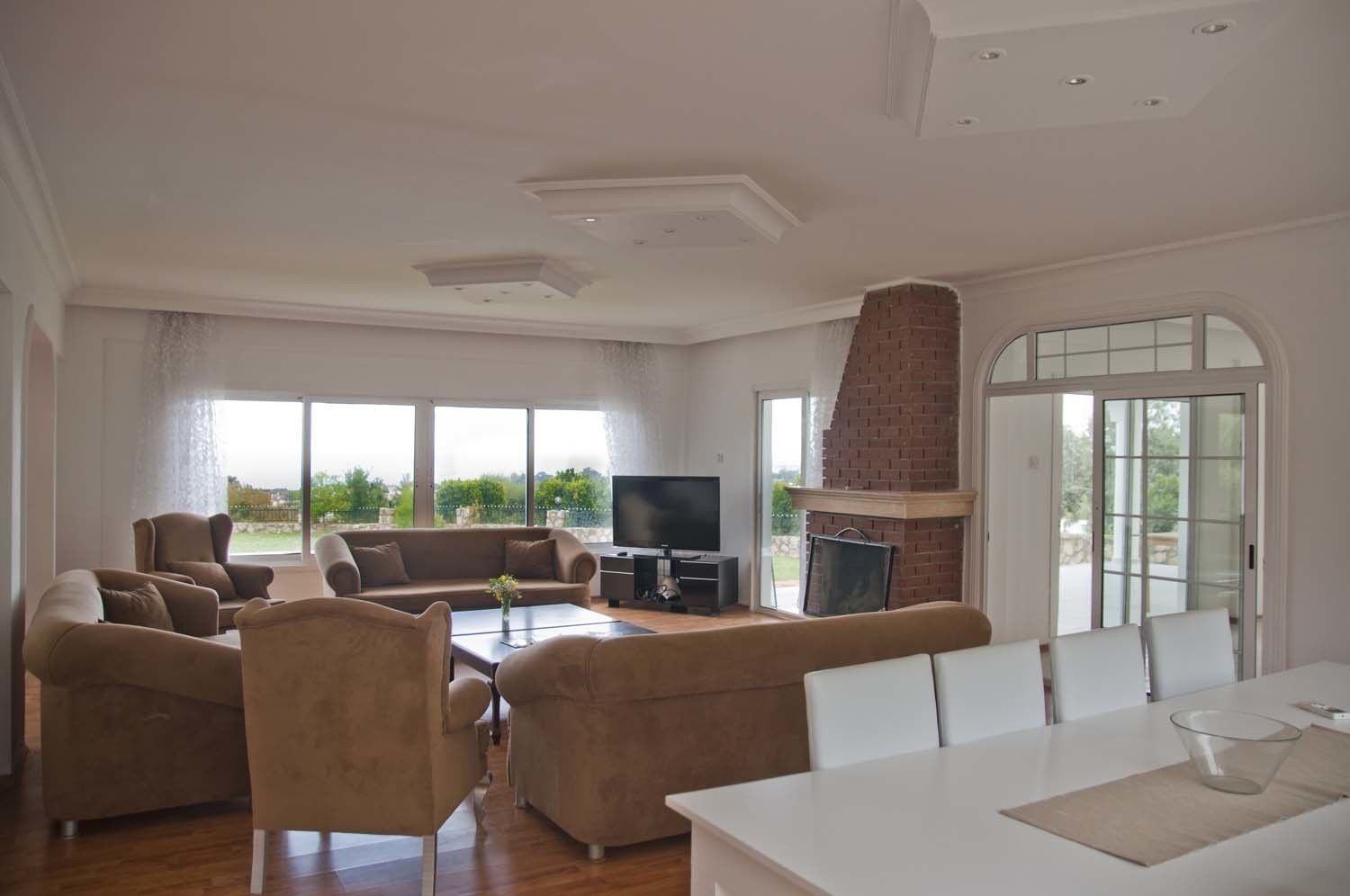 Panoramic Villa, 3 Yatak Odası, Teras, Deniz Manzaralı | Oturma alanı | Düz ekran televizyon, şömine, DVD oynatıcı, MP3 takma konsolu 