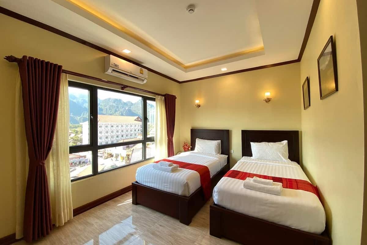 superior twin room | minibar, in-room safe, desk, blackout curtains