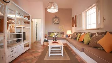 Villa, 4 Bedrooms | Living area | 32-inch TV with digital channels