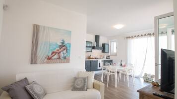 Villa, 2 Bedrooms | Living room | 32-inch TV with digital channels