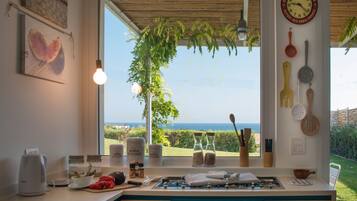 Villa, 5 Bedrooms | Private kitchen | Espresso maker, coffee/tea maker, full-size fridge, microwave