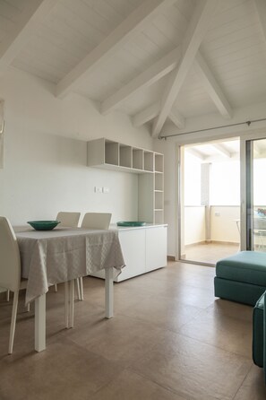 Elite Apartment, 1 Bedroom | Living room | Flat-screen TV - Aria di Vacanza - Azalee (Olbia)