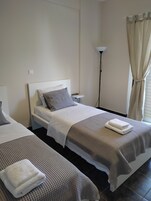 Comfort Room, 2 Twin Beds, Courtyard View | Free WiFi