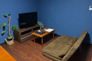 Appartement, Plusieurs lits | Salle de séjour | Téléviseur à écran plat