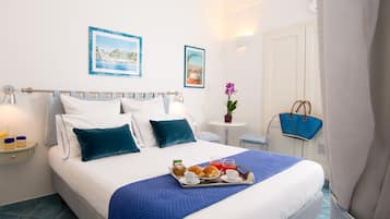 Standard Room, City View | Minibar, in-room safe, individually decorated, desk