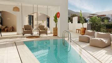 2 outdoor pools, open 9:00 AM to 7:00 PM, pool umbrellas, sun loungers