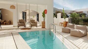 2 outdoor pools, open 9:00 AM to 7:00 PM, pool umbrellas, sun loungers
