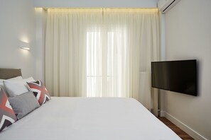 Appartement, 2 chambres | Literie de qualité, lit avec matelas à plateau-coussin, décor unique