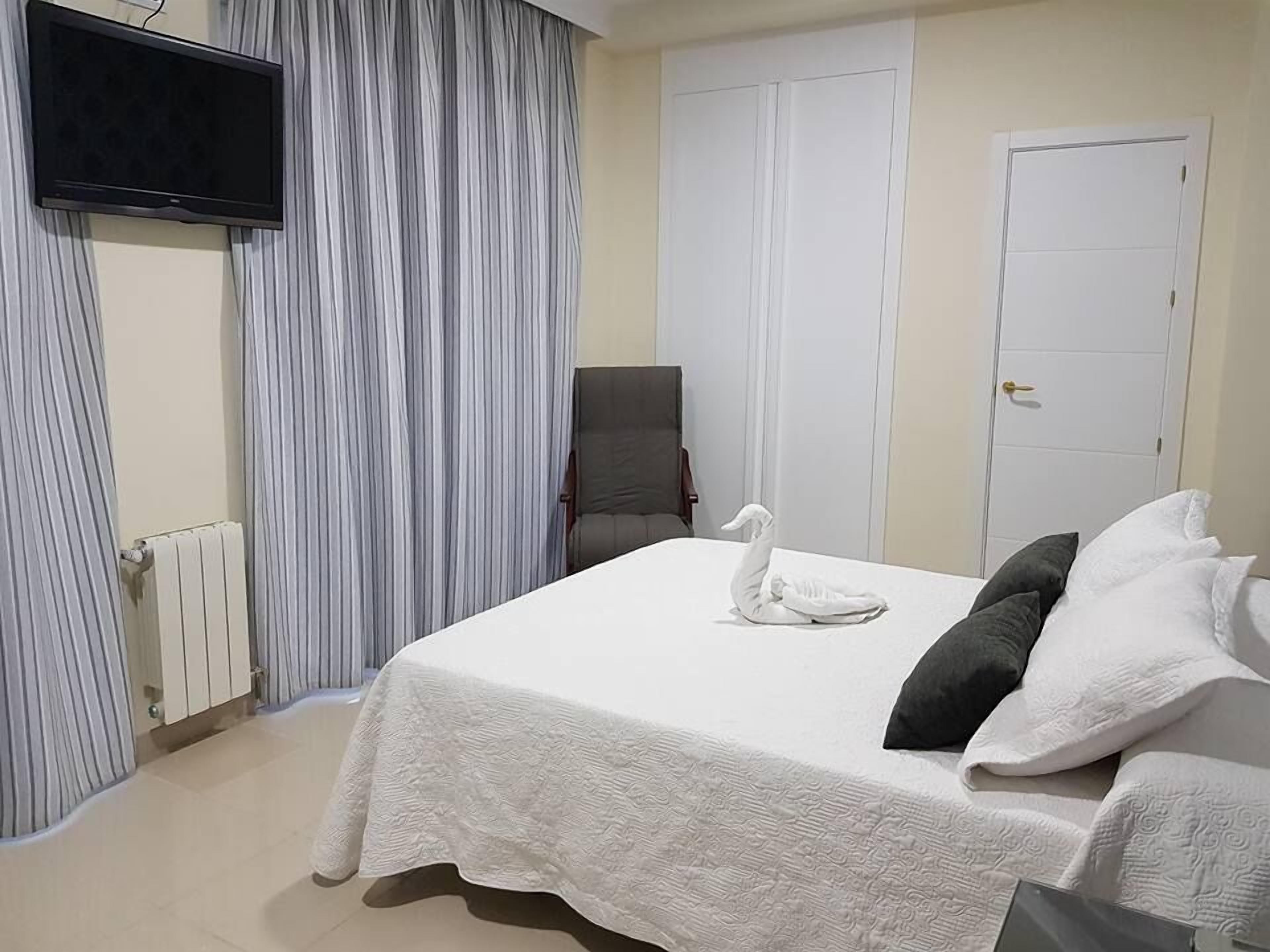 double or twin room | desk, blackout curtains, cots/infant beds, rollaway beds