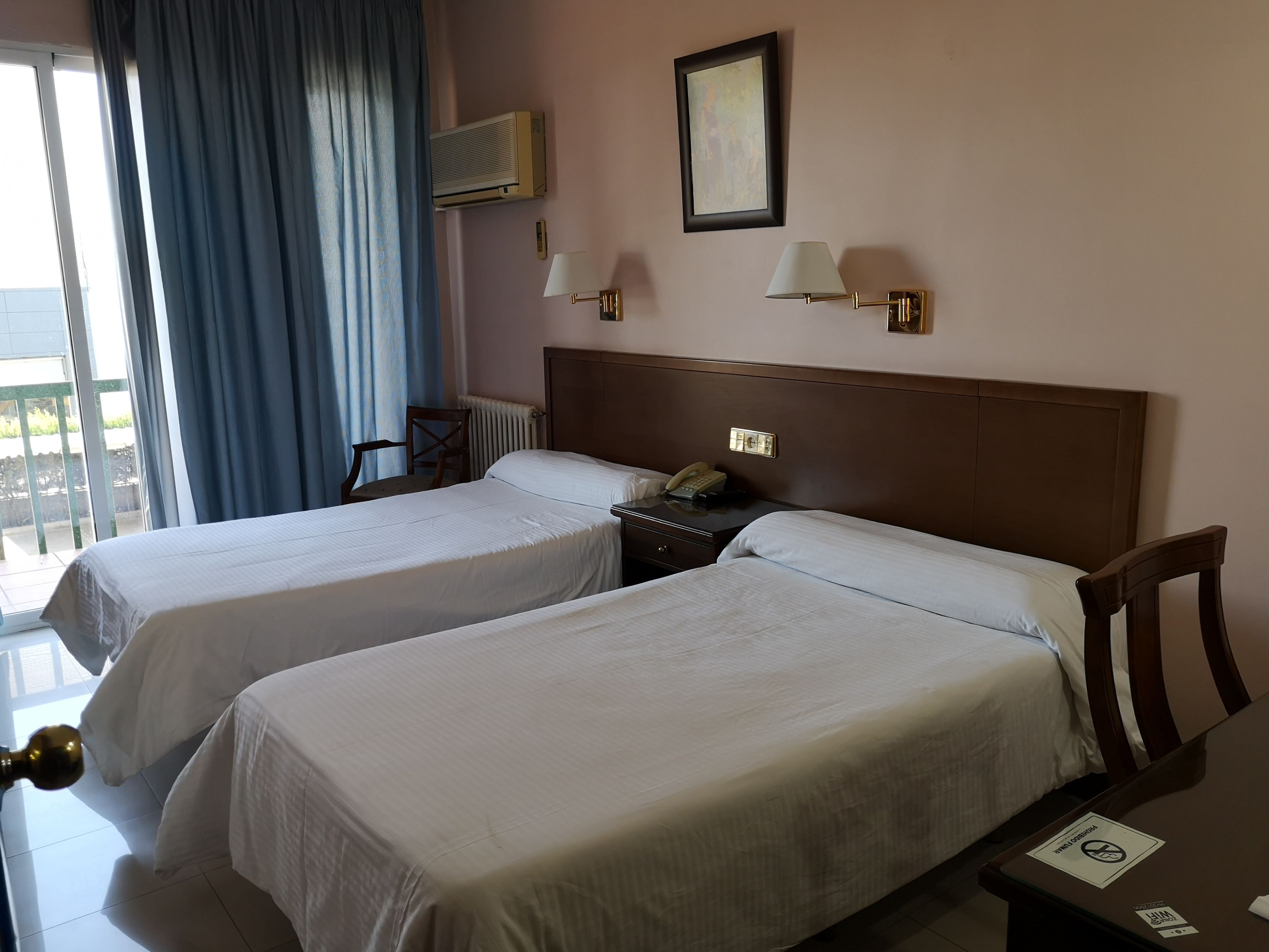 double or twin room | desk, blackout curtains, cots/infant beds, rollaway beds