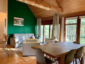 Apartment, Balcony, Garden View | Living area | Flat-screen TV