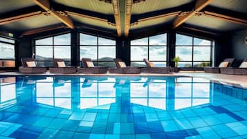 Indoor pool, open 7:00 AM to 10:00 PM, sun loungers