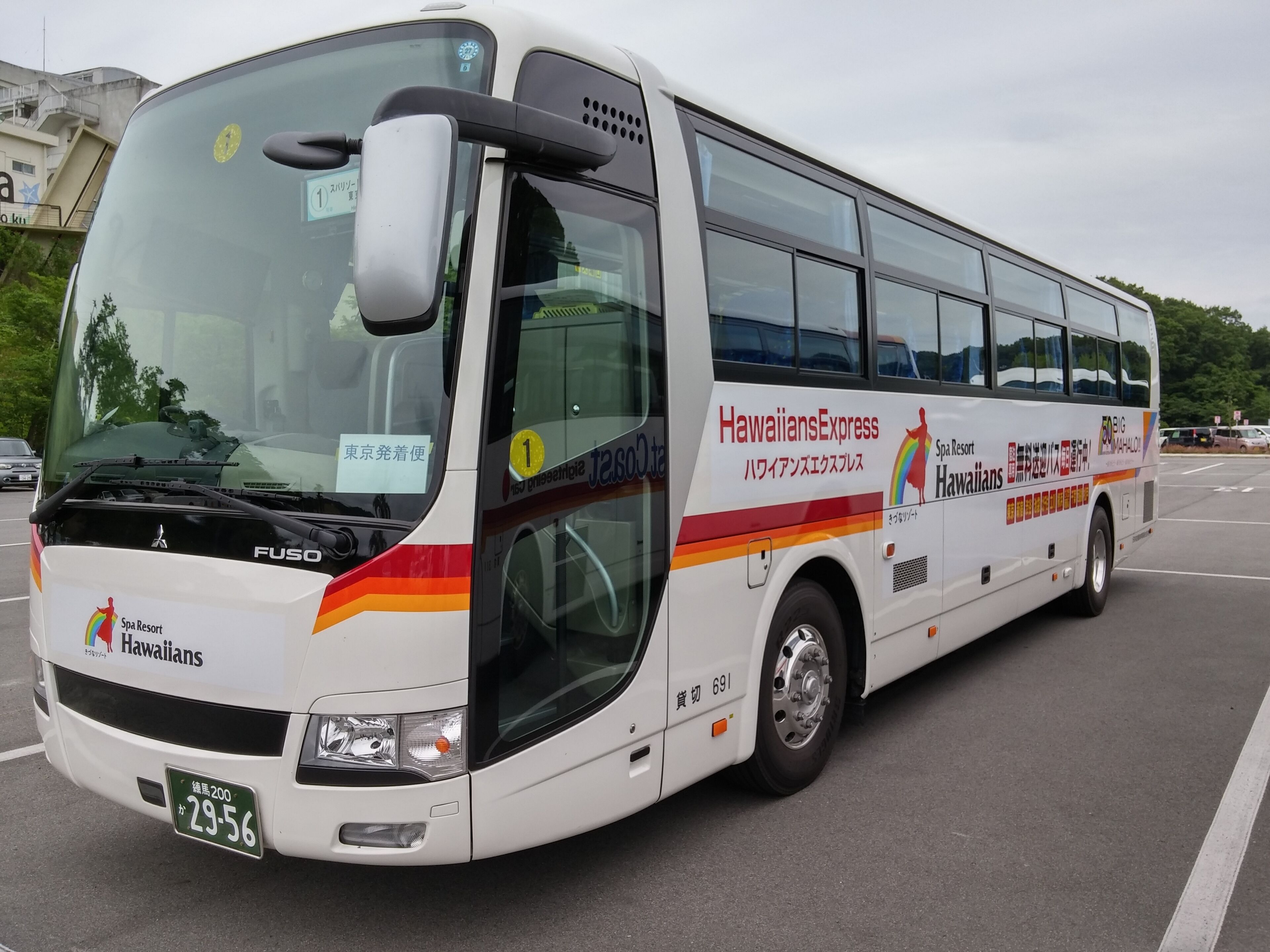 A large bus with "Hawaiians Express" branding and "Spa Resort Hawaiians" on the side.