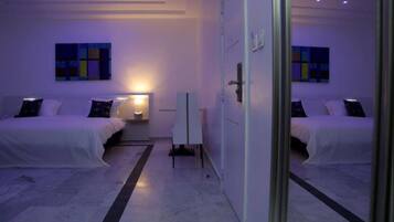 Family Room | Down comforters, minibar, in-room safe, desk