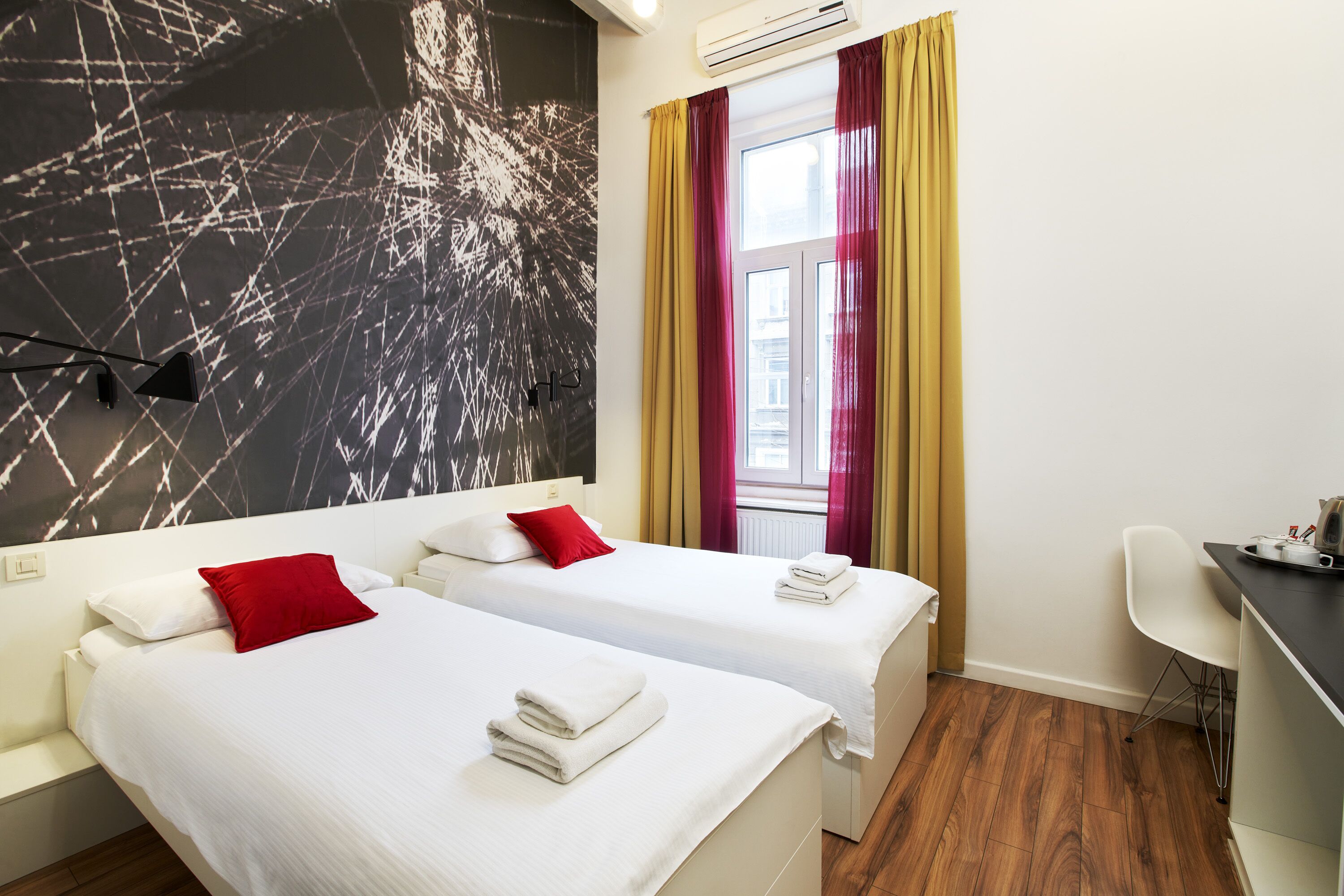 twin room | 1 bedroom, down duvets, in-room safe, blackout curtains