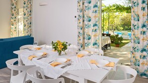 Family House, Multiple Beds, Garden View | In-room dining