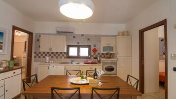 Villa, 3 Bedrooms | Private kitchen | Full-sized fridge, oven, stovetop, dishwasher