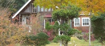 Log guest house with wide lawn garden