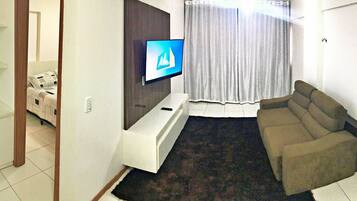 Apartment | Living area | 42-inch Smart TV with digital channels, TV, Netflix