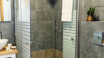 Shower, bathrobes, towels
