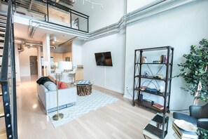 Premium Apartment, 1 King Bed | Living area | 42-inch LCD TV with cable channels, TV