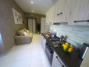 Frigorifero nell'area comune, forno a microonde nell'area comune