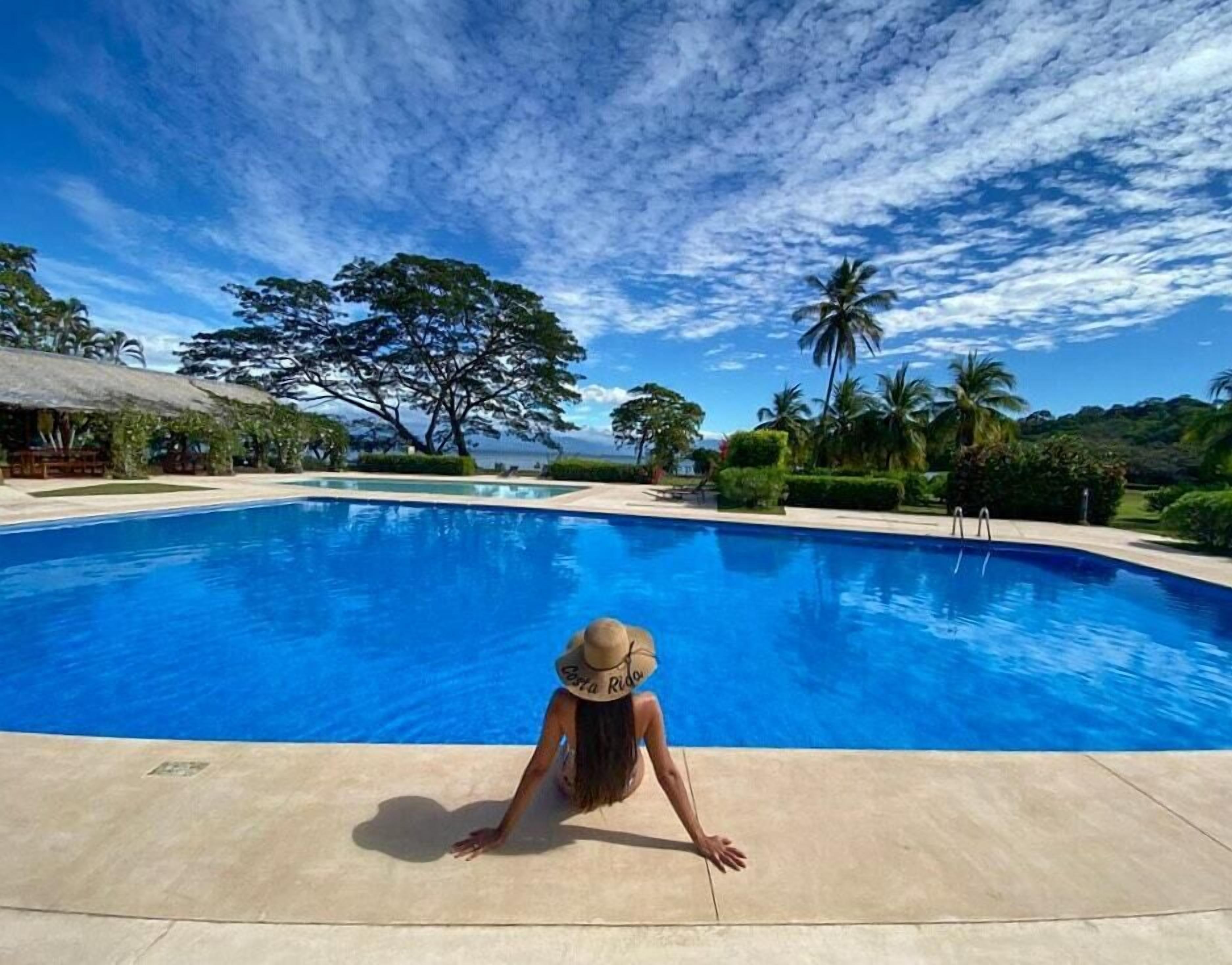 2 outdoor pools, pool umbrellas, pool loungers