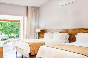 Deluxe Double Room, 2 Queen Beds | Premium bedding, in-room safe, desk, laptop workspace - OPacifico Hotel Boutique (Paquera)