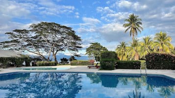 2 outdoor pools, pool umbrellas, pool loungers