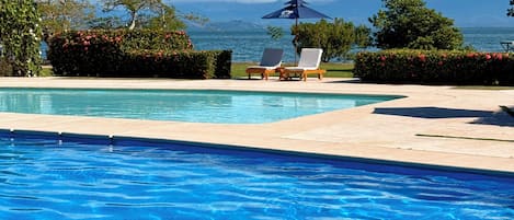 2 outdoor pools, pool umbrellas, sun loungers