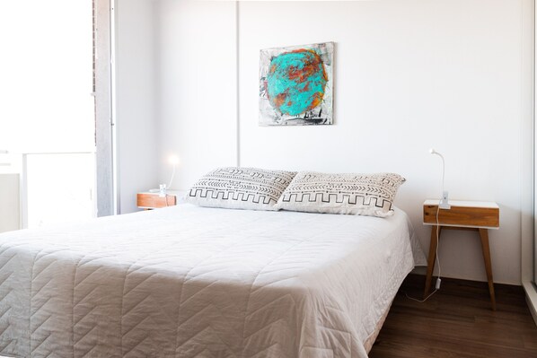 Apartamento família, 1 cama Queen e sofá-cama, vista para a cidade | Cortinas blackout, ferros/tábuas de passar roupa, Wi-Fi de cortesia