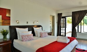 Habitación ejecutiva | Ropa de cama de alta calidad, minibar, escritorio