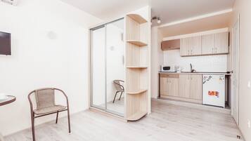 Studio Apartment | Living area | Flat-screen TV