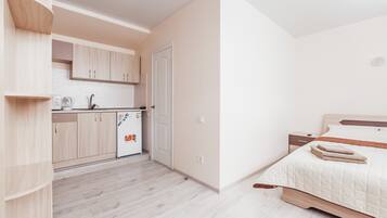 Studio Apartment | Living area | Flat-screen TV