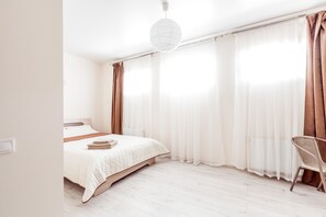 Estudio | Tabla de planchar con plancha, wifi gratis y ropa de cama 