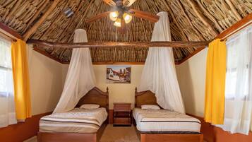 Classic Cabin, 2 Twin Beds | Down comforters, individually decorated, rollaway beds, free WiFi