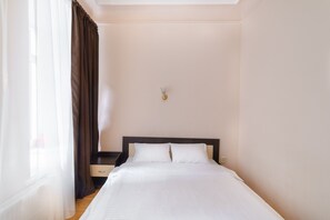 Appartement Familial, 1 grand lit et 1 canapé-lit | Rideaux occultants, chambres insonorisées, fer et planche à repasser