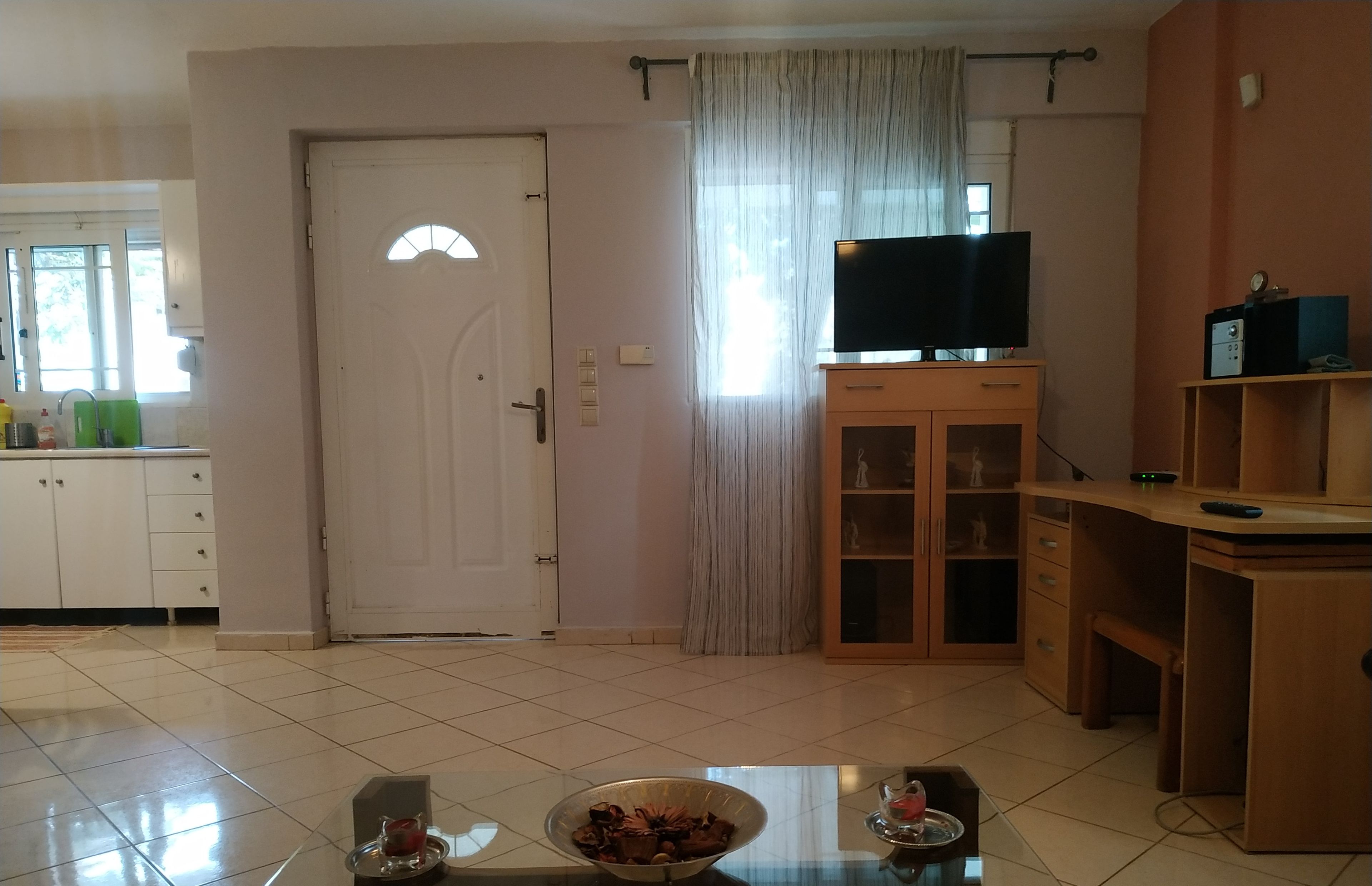 Eenvoudig appartement, meerdere bedden, uitzicht op tuin | Kameruitzicht