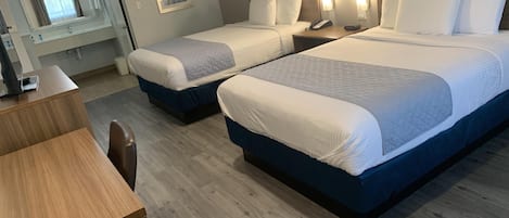 Premium bedding, down comforters, memory foam beds, desk