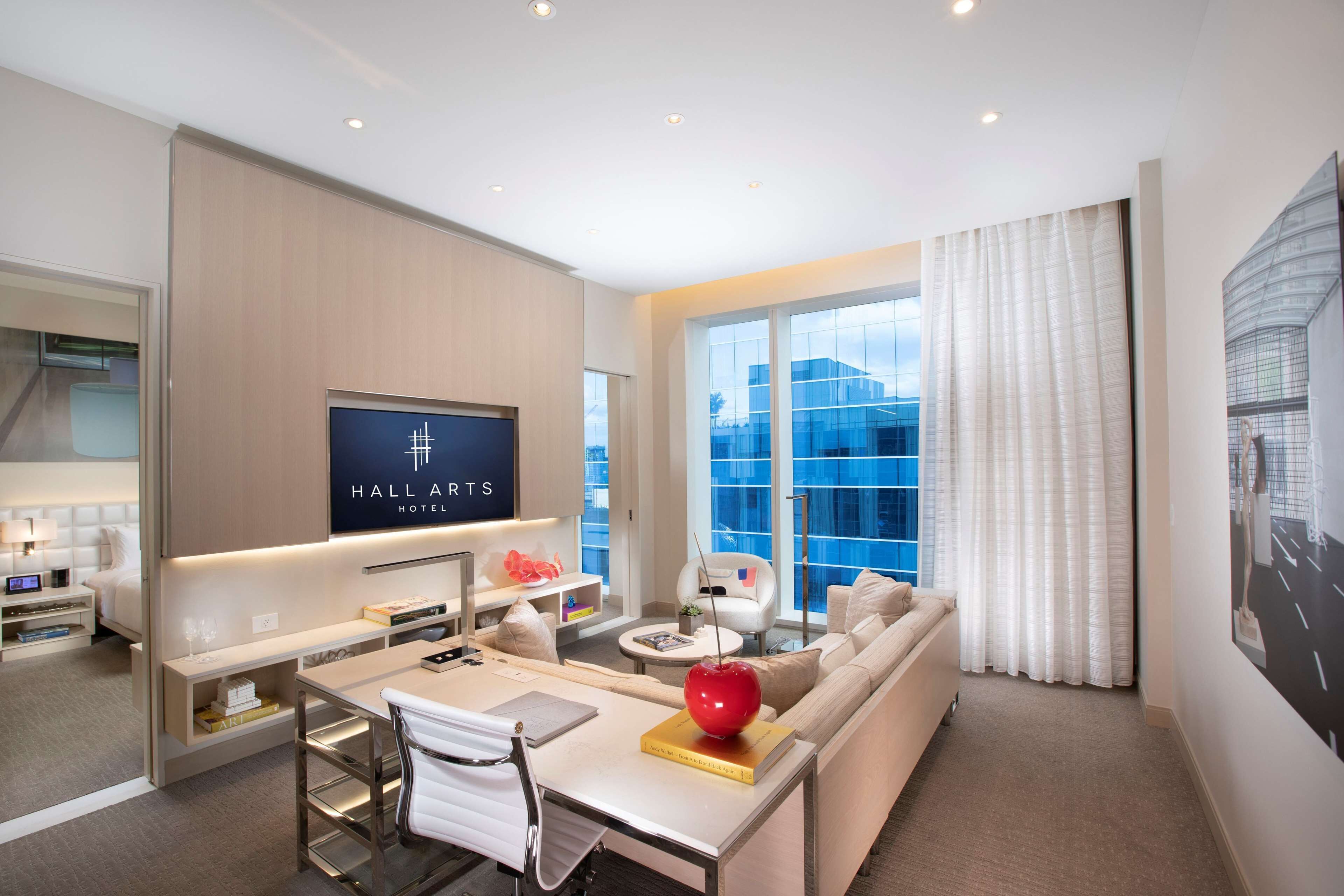 suite, 1 king bed (hall, speciality) | living area | 55-inch smart tv with satellite channels, tv, netflix